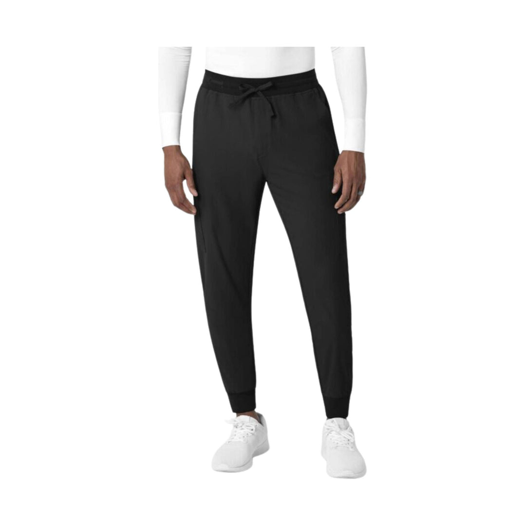 Black jogger-style pants with elastic waistband, drawstring, tapered legs, and ankle cuffs