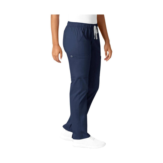 Navy straight-leg scrub pants with drawstring waist, cargo pocket, and white sneakers