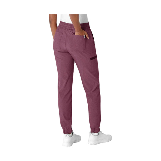 Maroon jogger scrub pants with elastic waist, cargo pockets, and tapered cuffs, shown from the back