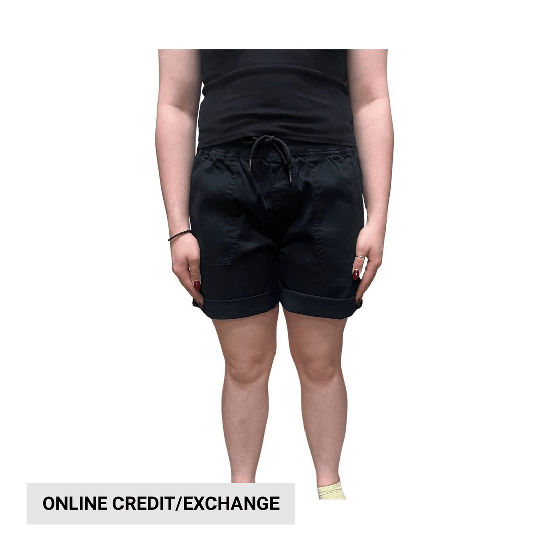 Black drawstring athletic shorts on a model, with "ONLINE CREDIT/EXCHANGE" text at the bottom.