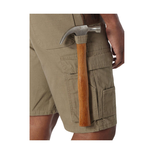 Khaki cargo shorts with side pockets and a hammer tucked into the pocket