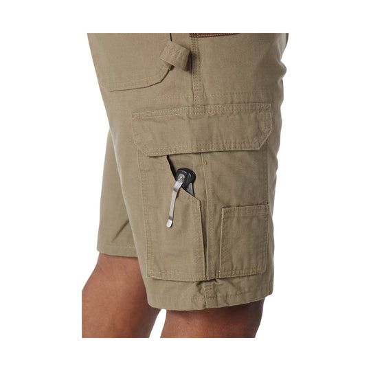Khaki cargo shorts with multiple flap pockets and a side knife pocket