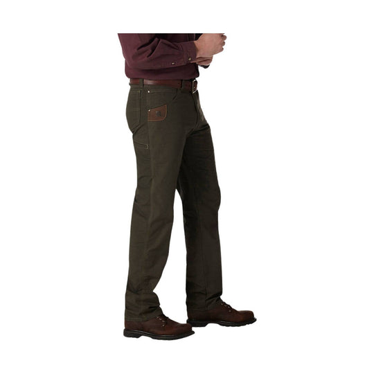 Person wearing green pants and shoes on a white background