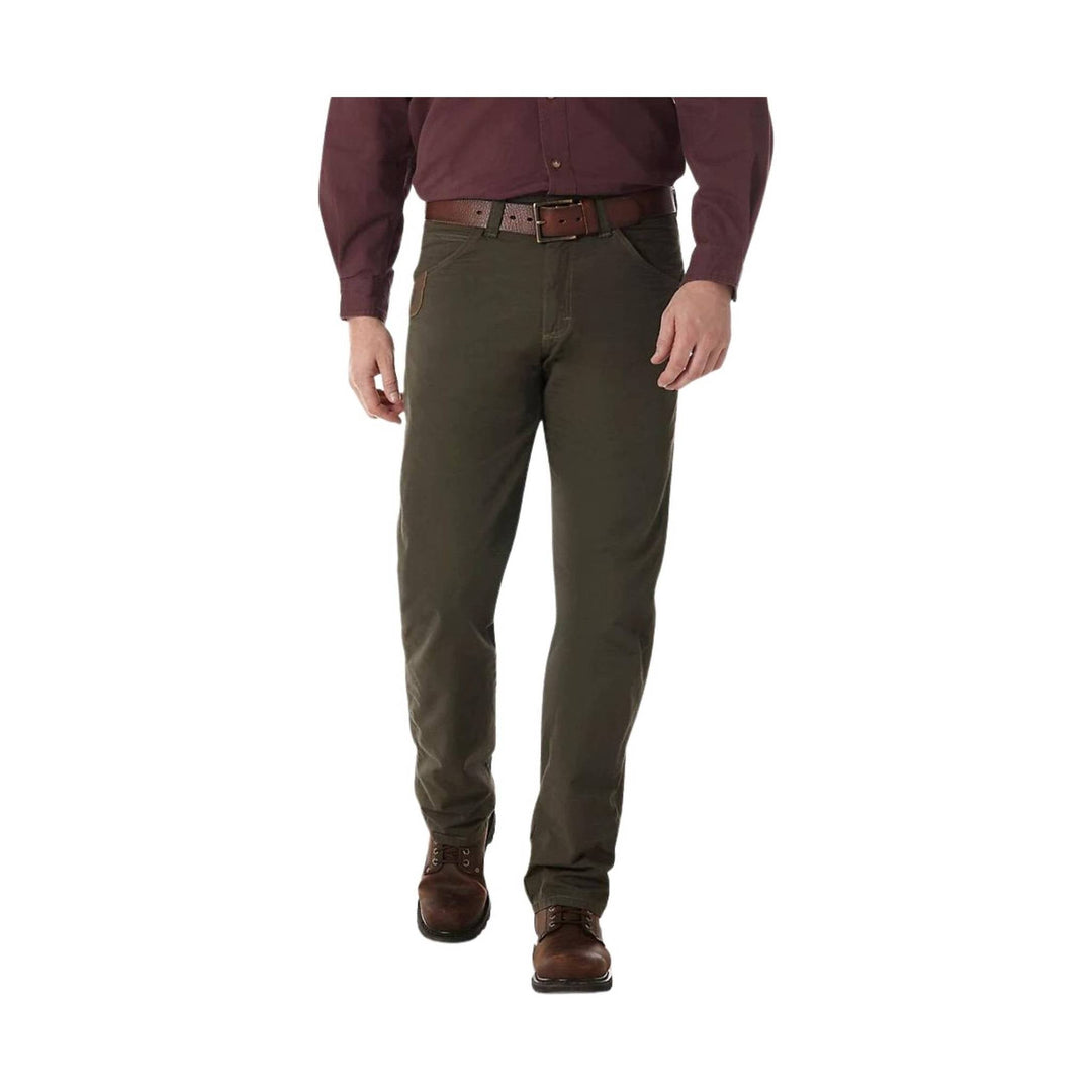 Person wearing green pants and a maroon shirt on a white background