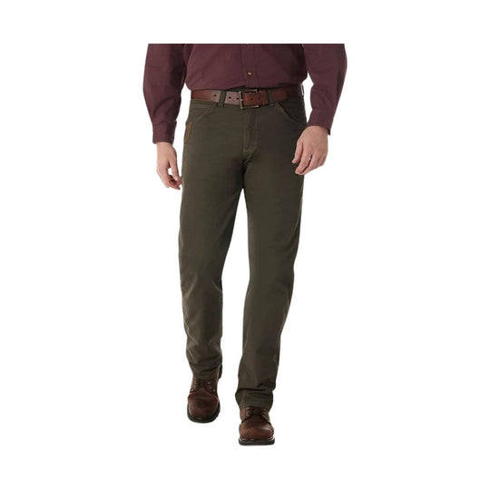 Person wearing green pants and a maroon shirt on a white background