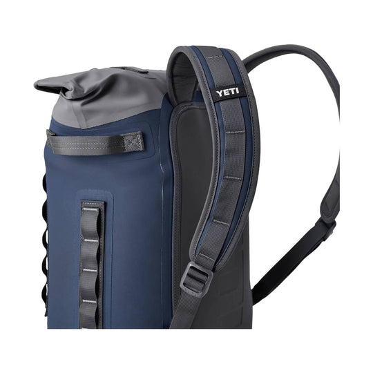 Blue and gray roll-top backpack cooler with padded shoulder straps and visible YETI logo