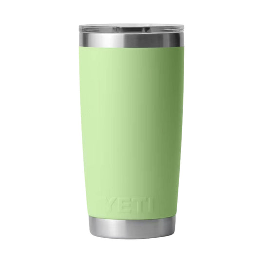 Light green insulated tumbler with stainless steel rim and base, embossed YETI near the bottom