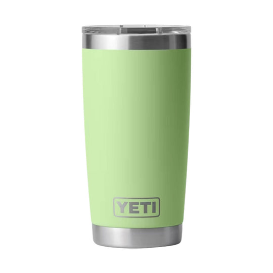 Light green insulated tumbler with a stainless steel rim and base, shown with YETI logo