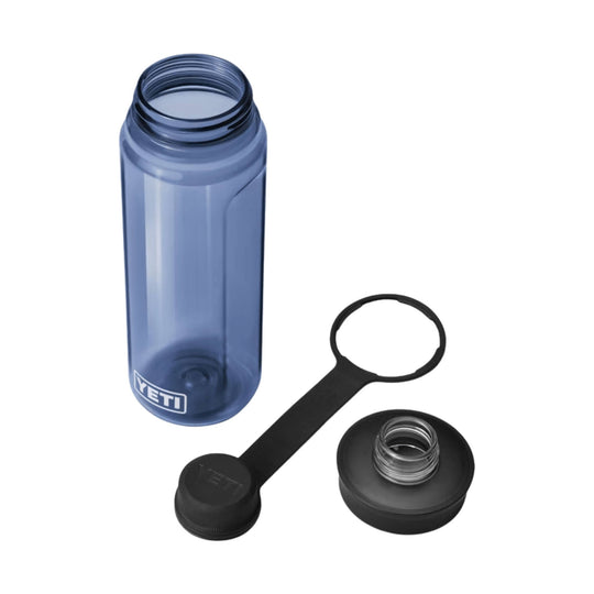Translucent blue water bottle with screw cap, tethered lid ring, and separate black cap
