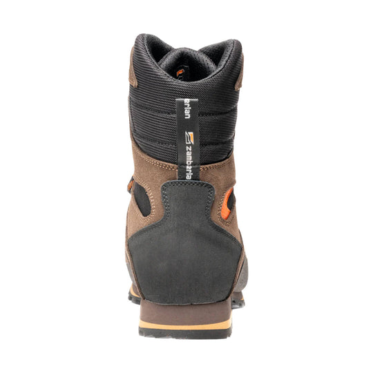 Brown and black hiking boot shown from the back with a tall padded collar, pull tab, and orange side accents.