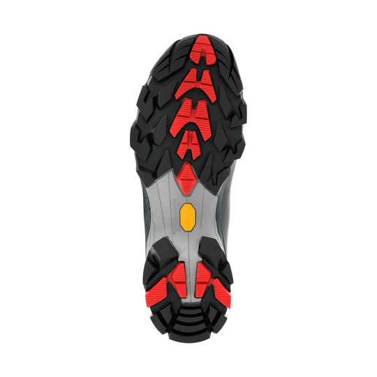 Black hiking boot outsole with red traction lugs and a gray midfoot shank