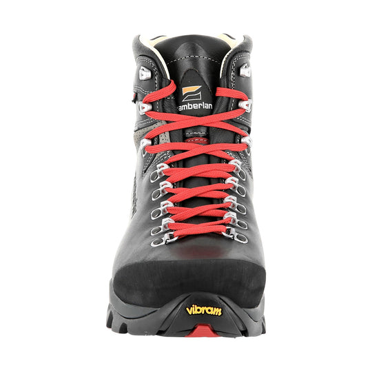 Black hiking boot with red laces, metal eyelets, and a Vibram sole