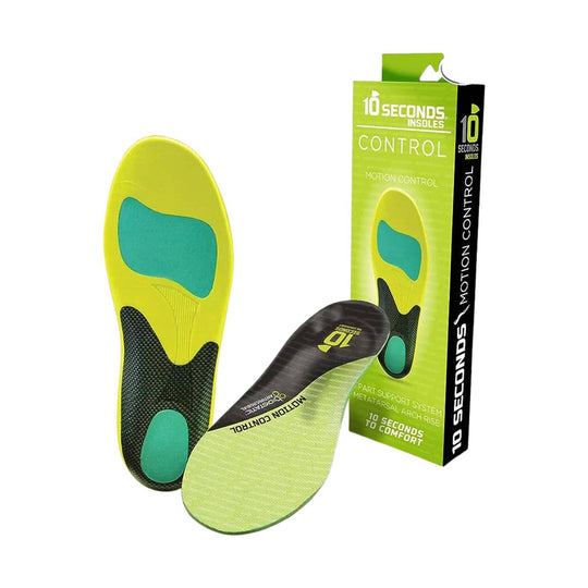 Yellow and green motion control insoles with black heel support, shown beside product packaging
