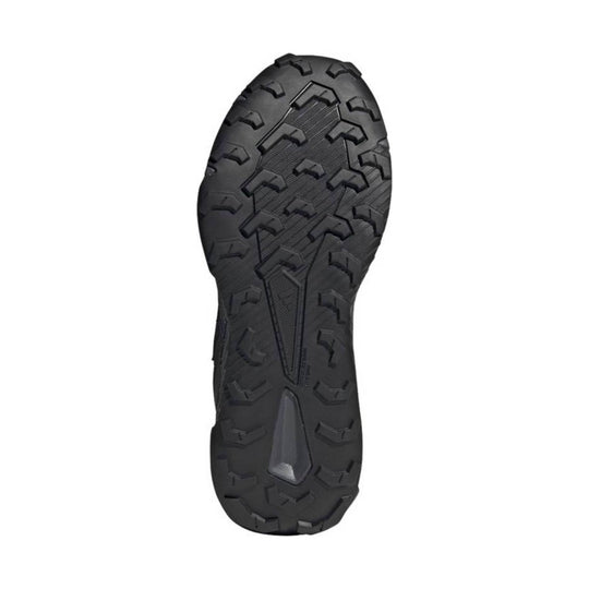 Black rugged shoe outsole with deep tread lugs