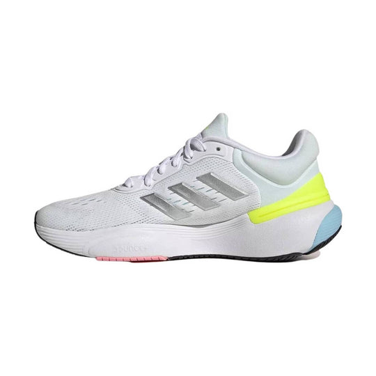 Light gray athletic running shoe with three side stripes, lace-up closure, and neon yellow heel accent