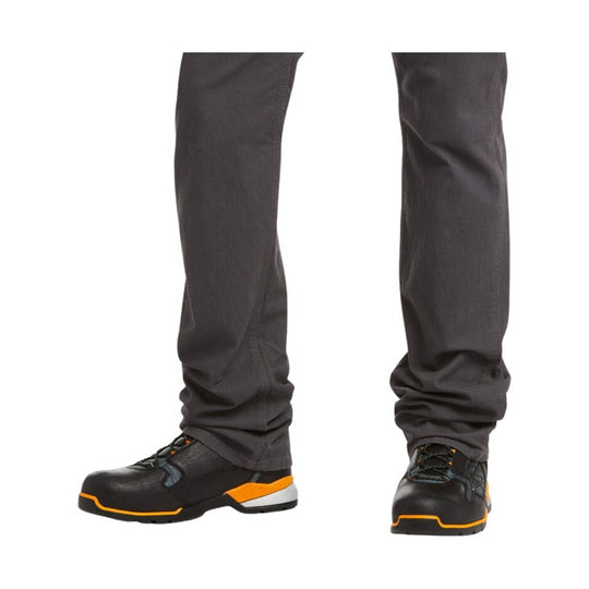 Gray straight-leg pants worn with black work shoes