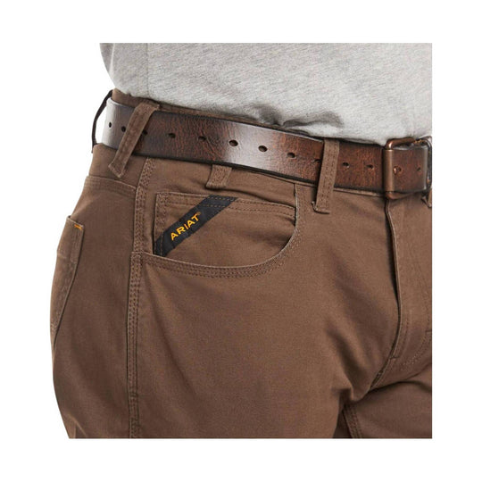 Brown work pants with belt and visible rear pocket logo tag