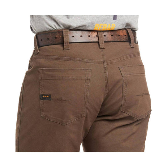 Brown work pants shown from the back with utility pockets and belt loops
