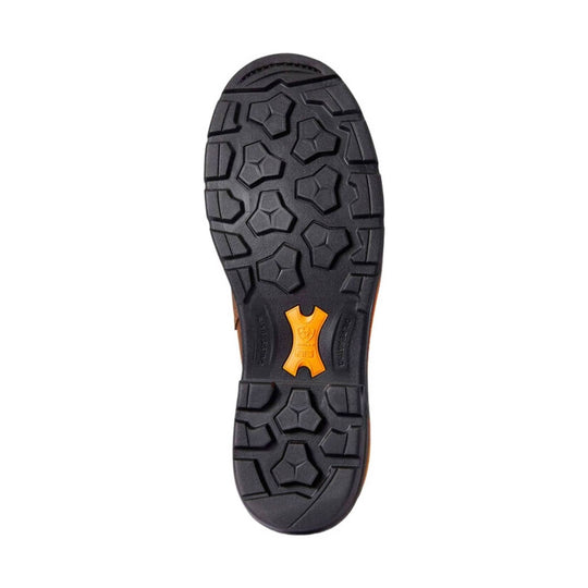 Black lugged boot outsole with an orange shank insert