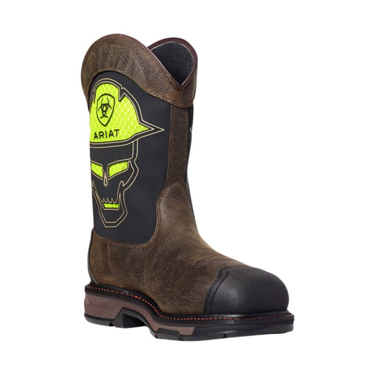 Brown western work boot with black shaft panel, neon green skull graphic, and visible Ariat text