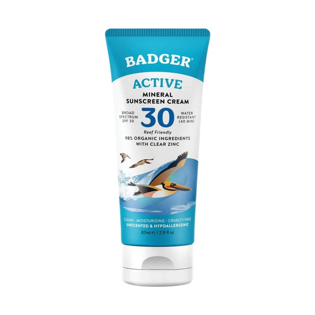 Blue and white sunscreen tube with pelican artwork and a large 30 on the front