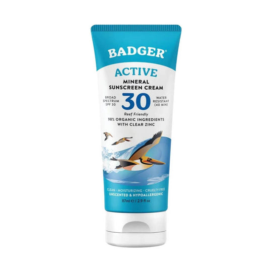 Blue and white sunscreen tube with pelican artwork and a large 30 on the front