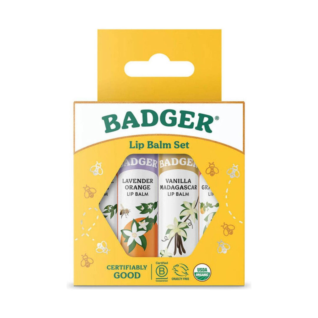 Yellow boxed lip balm set with a window showing four tubes