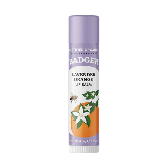 Purple lip balm tube with orange and flower illustration