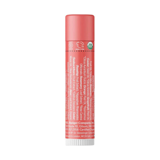 Coral lip balm tube with USDA Organic and Cruelty Free labels