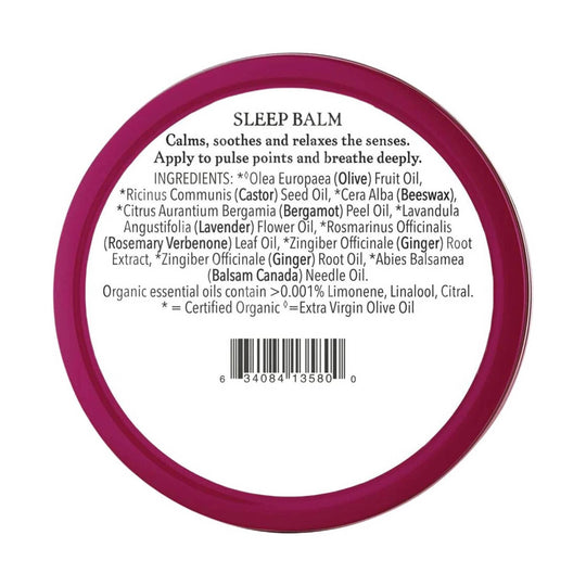 Round magenta balm tin lid with ingredient text and barcode