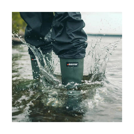 Green rubber waterproof boots splashing through water, with BAFFIN logos on the shafts