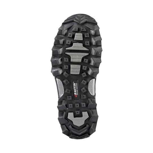 Black winter boot outsole with deep lugs and gray traction inserts