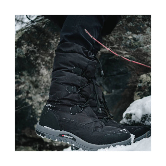 Black insulated winter boot with lace-up side toggles and a gray sole