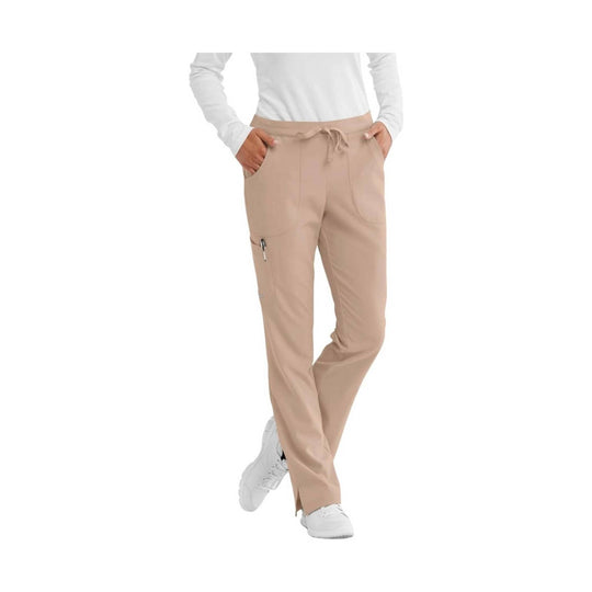 Beige straight-leg scrub pants with drawstring waist, side pockets, and a zip cargo pocket