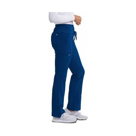 Side view of navy blue women’s cargo scrub pants with drawstring waist and flap cargo pockets