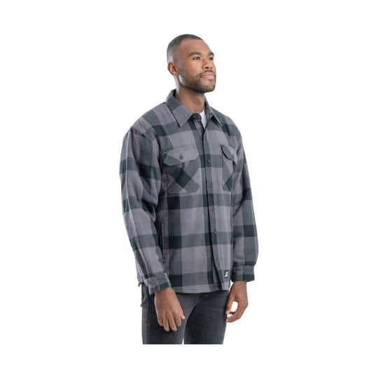 Gray-and-black plaid button-up shirt with chest pockets and long sleeves, shown on a model