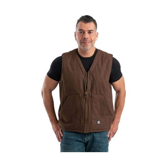 Brown zip-front vest with front pockets worn over a black T-shirt and jeans