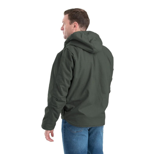 Dark green hooded work jacket shown from the back and side on a man, with long sleeves and a zip front.