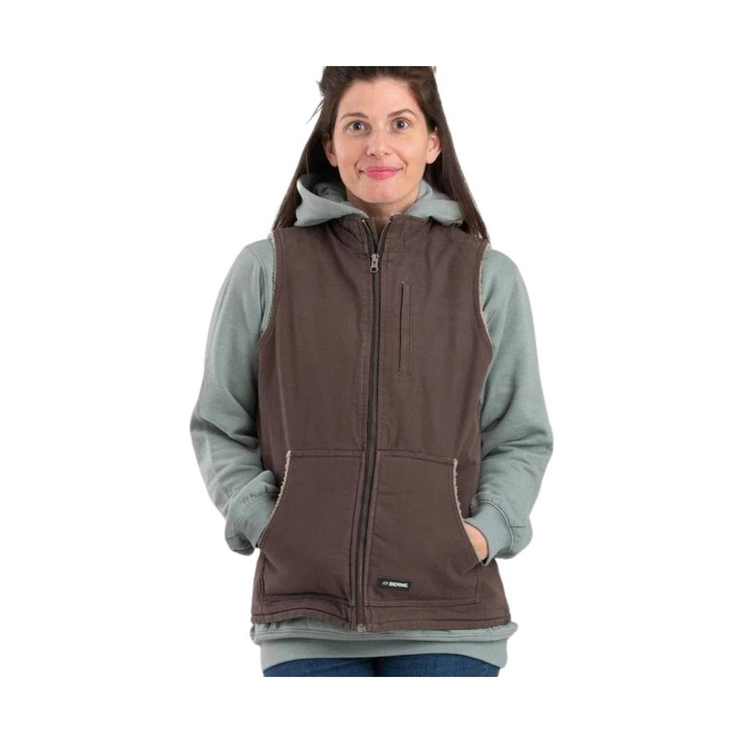 Woman modeling a brown zip-front hooded vest over a light gray hoodie with front pockets