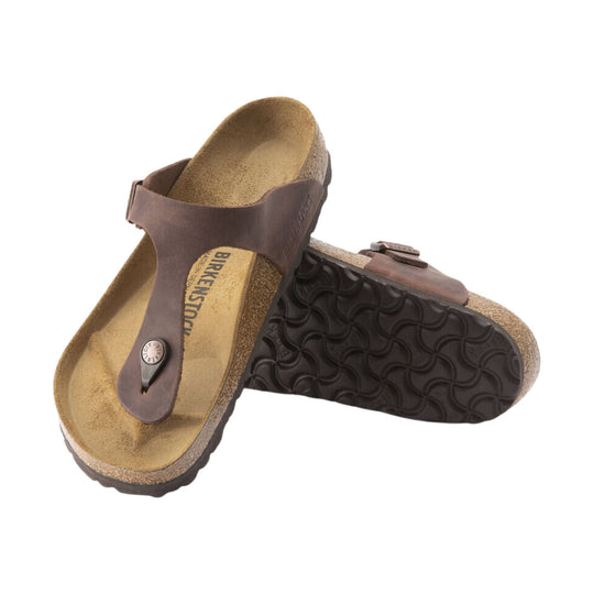 Brown thong sandals with contoured cork footbeds, toe loop straps, and buckles