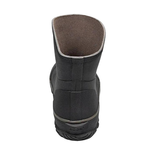 Black mid-height rubber boot with a brown padded shaft and lugged sole, shown from the back
