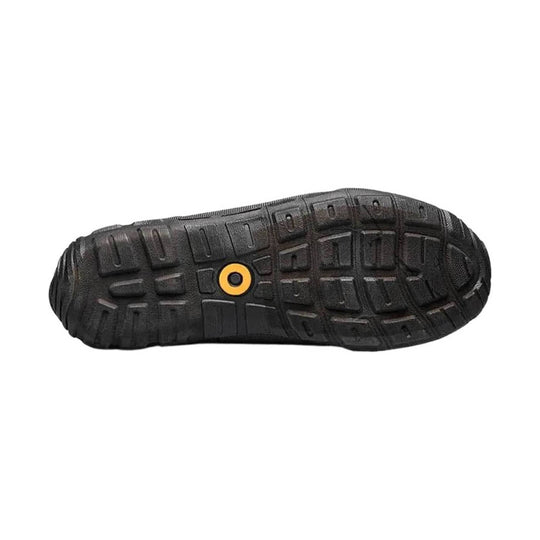 Black rubber boot outsole with deep tread and yellow circular logo
