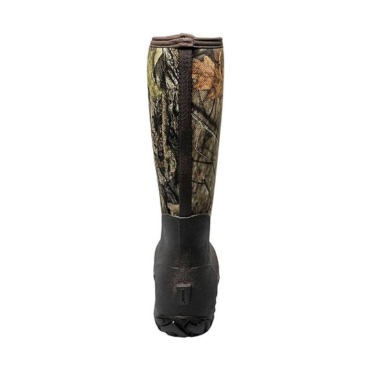 Tall camouflage rubber boot with a black lower shaft and lugged sole, shown in side view.