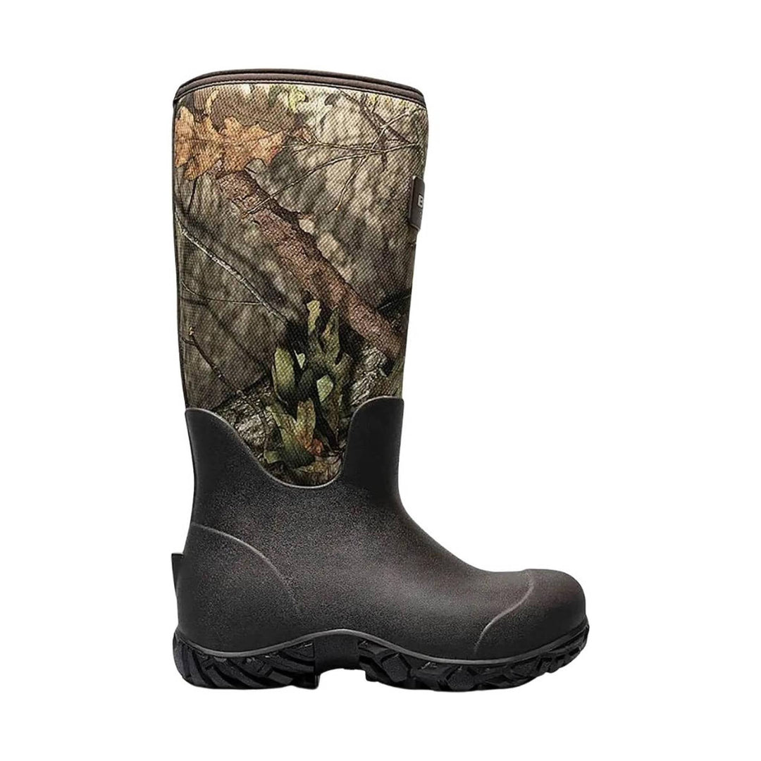 Tall camouflage rubber hunting boot with black lower shell and treaded sole
