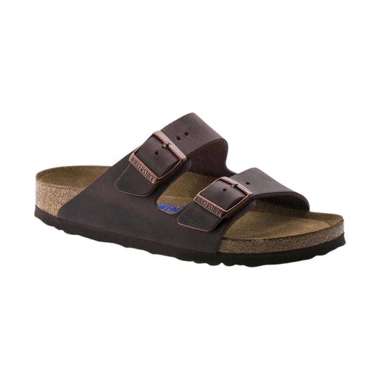 Brown double-strap cork footbed sandal with adjustable buckles and embossed buckle text