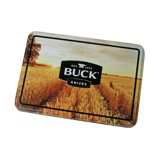 Buck Knives tin with a field landscape and logo on the lid