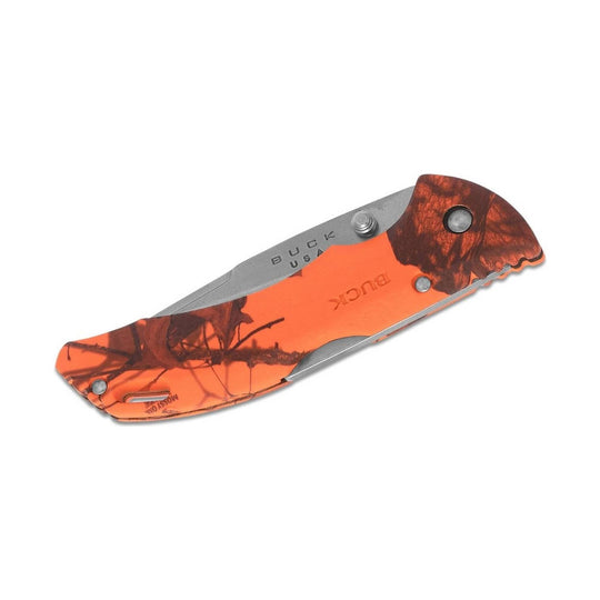 Folded pocket knife with orange camouflage handle and gray metal blade, showing BUCK and USA text