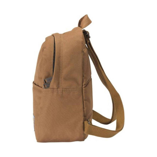 Tan canvas mini backpack shown in side view with a front zipper pocket and adjustable shoulder straps