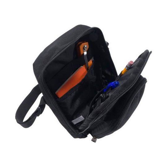 Black zippered crossbody bag open to show interior pockets and pens