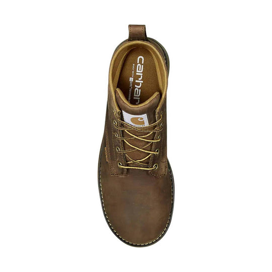 Brown leather lace-up work boot viewed from above with a pull tab and visible Carhartt branding on the insole.